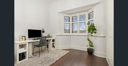 Luxury Tudor Residence with Modern Elegance and Family Appeal - Photo 4