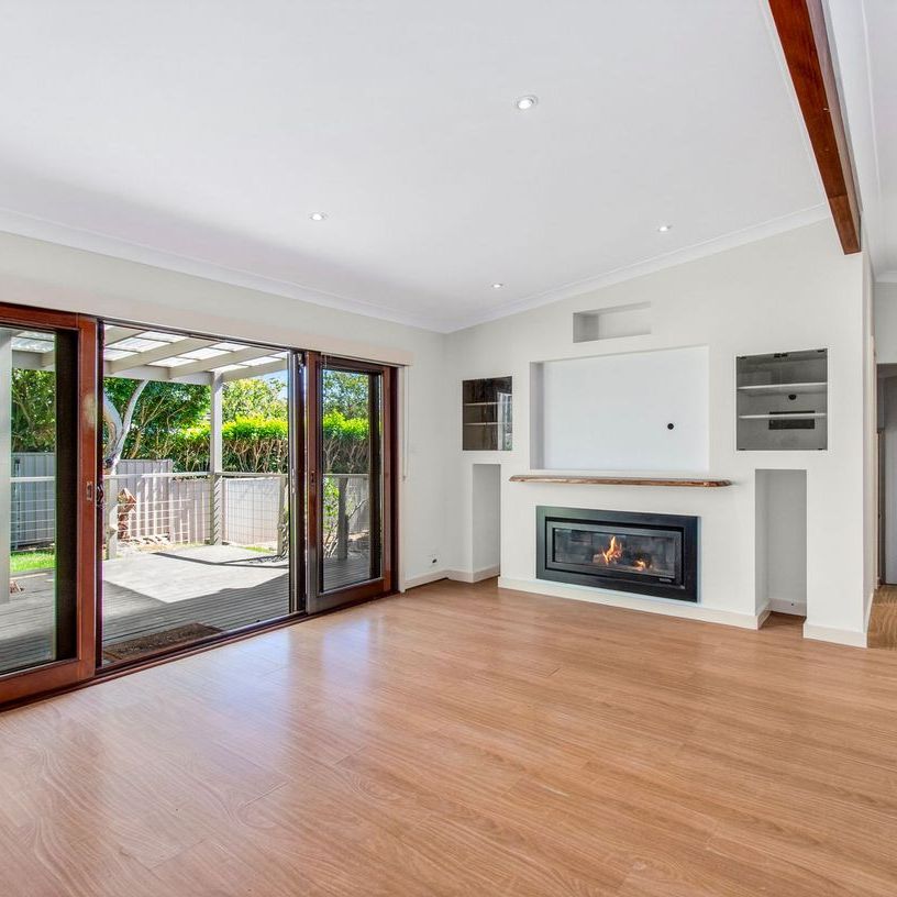 LIGHT-FILLED FAMILY RETREAT OFFERING SPACE AND CONVENIENCE - Photo 1