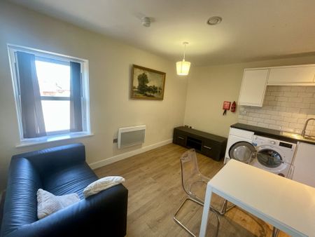 Beautiful furnished one‑bed apartment in Derby’s Cathedral Quarter. Modern open‑plan living, stylish kitchen, double bedroom, and contemporary shower room. Second‑floor home with LED lighting, secure entry and excellent city‑centre access. Available now. - Photo 4
