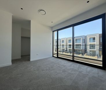 Spacious Three-Level Townhouse with Workshop & Dual Outdoor Living - Photo 6