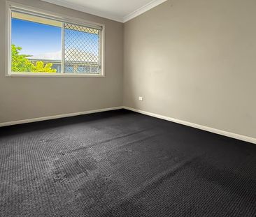 Spacious High Set Family Home with Multiple Living Areas & Moreton ... - Photo 4