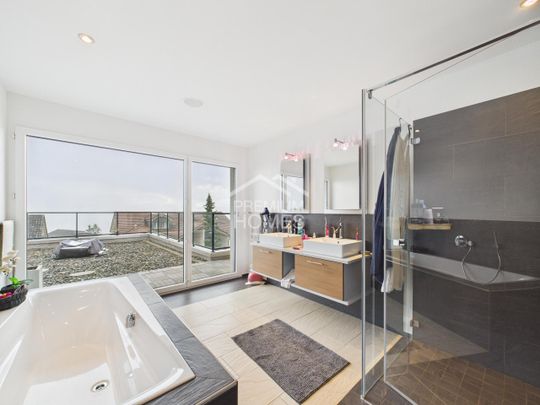 Architektur trifft Panorama: Wohnen mit Seeblick - Photo 1