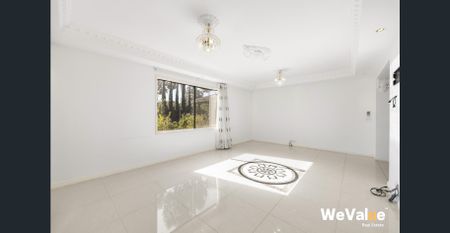 Large Family Home with Multiple Living Areas - Photo 5