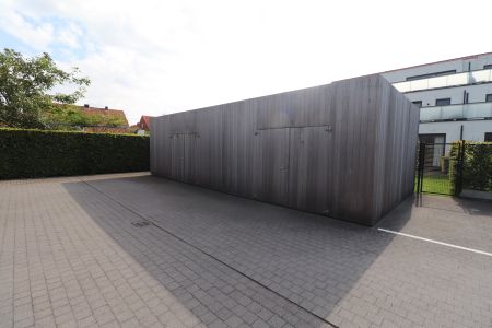 Een recent gelijkvloers appartement met 2 slaapkamers, tuin, autostaanplaats en kelderberging. - Photo 4