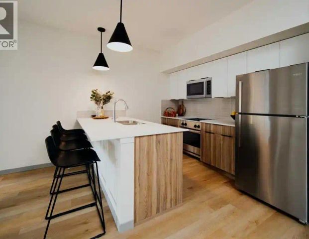 255 & 245 Carrington Plaza — 1 Bedroom - Photo 1