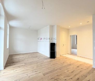 Erstbezug mit Stil: 2-Raum-Traum mit Kamin & Balkon - Photo 3