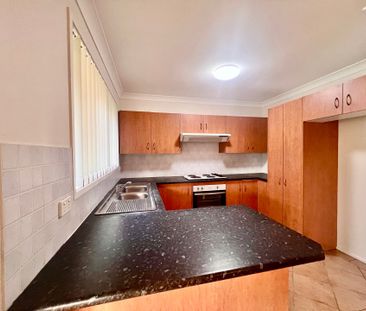 Neat and tidy 3 bedroom home with Split system air conditioning! - Photo 6