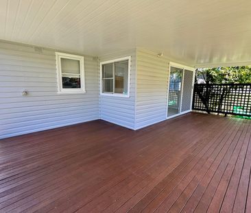 Freshly Updated Home with a Spacious Covered Deck - Photo 4
