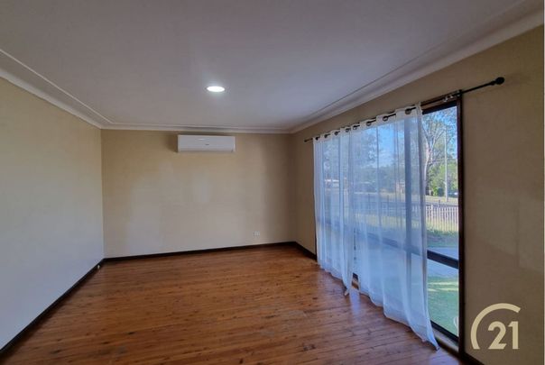 Well-Kept Family Home in a Convenient Location! - Photo 1