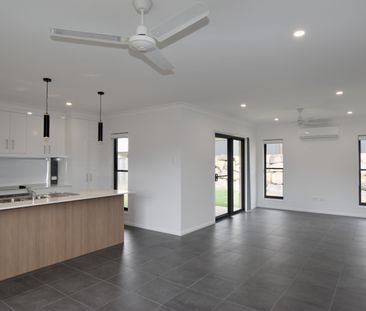 MODERN FOUR BEDROOM HOME IN THE HEART OF RIVERSTONE RISE - Photo 2