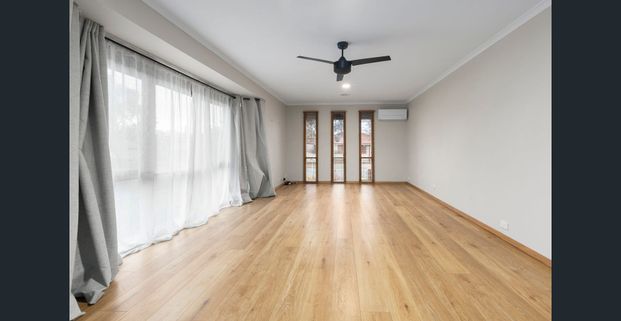 Bright, Comfortable, and Ideally Located - Photo 1