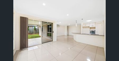 Large Family-Sized Home in Desirable Suburb! - Photo 3
