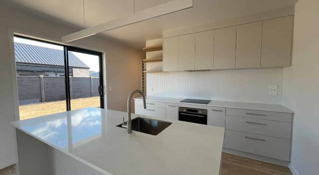 Brand New 4 Bedroom Home with Comfort in Mind - Photo 1