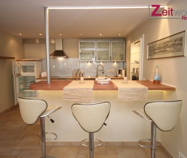 Exklusive möblierte Souterrain-Wohnung mit Terrasse in ruhiger Lage - Photo 6