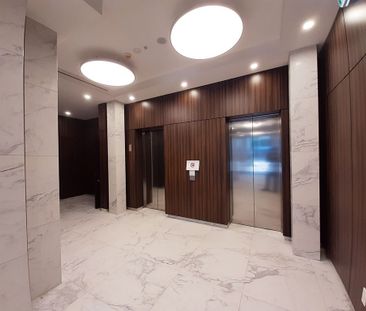 Double Level Apartment in Great Location - Photo 2