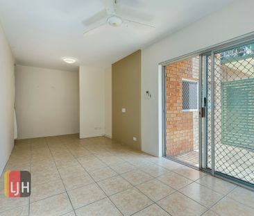 CENTRALLY LOCATED, 3 BEDROOM UNIT WITH A/C! - Photo 5
