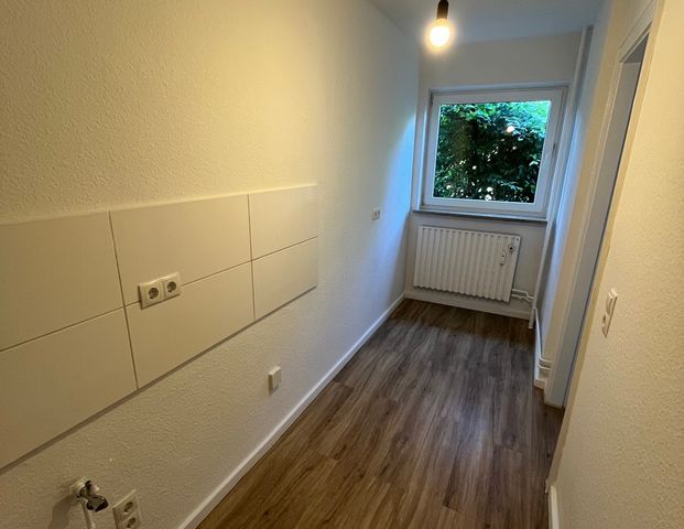 Kleine Erdgeschosswohnung mit Terrasse! - Foto 1