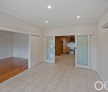 Open the door to a beautifully four-bedroom family home - Photo 4