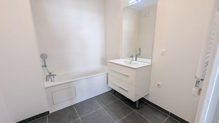 location Appartement T2 DE 42.75m² À TAVERNY - Photo 4