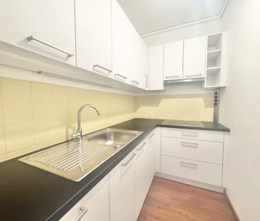 Sonnige 2-Zimmer-Wohnung mit Balkon in der Terrassenhaussiedlung, Graz - Photo 1