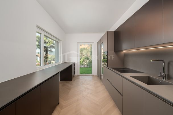 DUPLEX DI 6.5 LOC. CON GIARDINO E VISTA LAGO A RUVIGLIANA - Photo 1