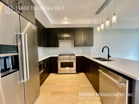 LUXURY AND ELEGANT 2BED/2BATH CONDO AT THE HARBOUR CLUB + UTILITIES - Photo 2