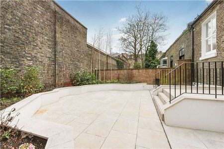 A Masterfully Refurbished Six-Bedroom Townhouse on Cranley Place - Photo 4