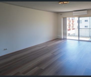 RECENTLY RENOVATED 2 BEDROOM APARTMENT - AVAILABLE NOW! - Photo 1