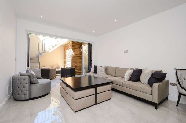 A superb four bedroom home set within a secure and secluded gated development. - Photo 1