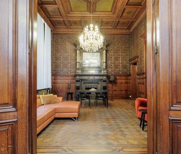Uniek authentiek gelijkvloers appartement met buitenruimte - Foto 1