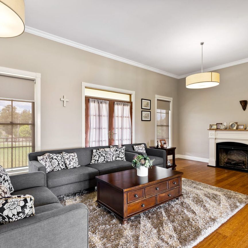 Impressive 4-Bedroom Home with In-Law Accommodation & Huge Storage - Photo 1