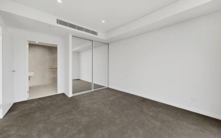 Seamless & Vibrant Brand-New Contemporary Apartment with Skyline News - Photo 5