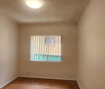 CONVENIENTLY LOCATED TWO BEDROOM UNIT - Photo 5