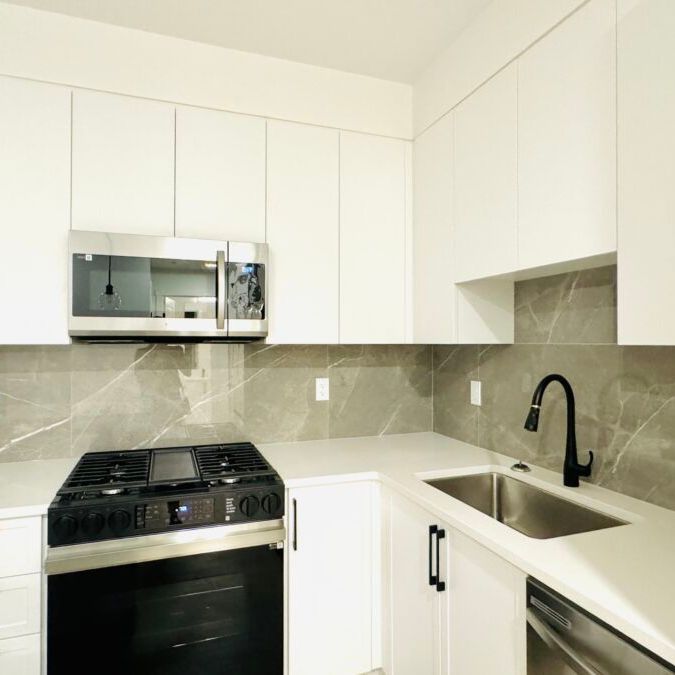 New Condo in Surrey – Top Floor! - Photo 1