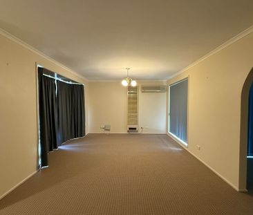 SPACIOUS FAMILY HOME WITH HUGE GARAGE SPACE - AVAILABLE NOW! - Photo 2