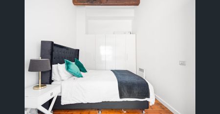 Fully Furnished- Contemporary warehouse spread over three impressive levels in a boutique block. - Photo 2