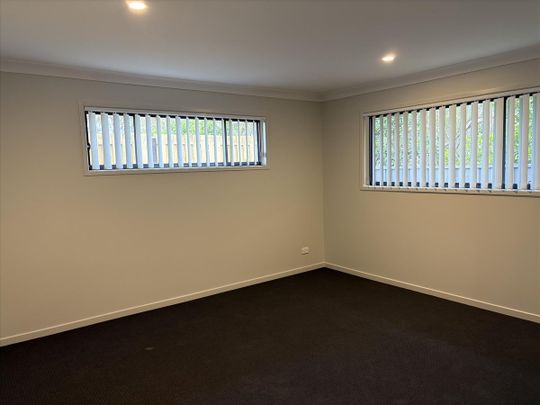 Modern Family Home In Quite Burpengary East Estate - Photo 1