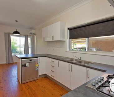 NEAT THREE BEDROOM HOME! - Photo 1