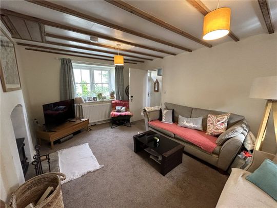 Available mid-October, Blacksmiths Cottage is a recently refurbished stone-built cottage set in the picturesque, sought after village of Nunnington. - Photo 1