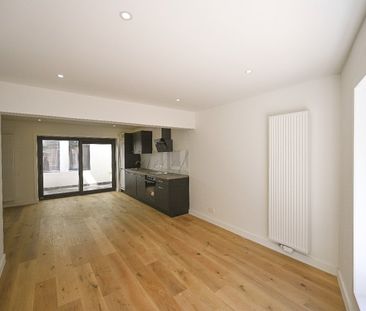 KNAP GELIJKVLOERS APPARTEMENT MET STADSTERRAS - Photo 4