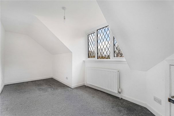 Pine Cottage is a detached family home in Chalfont St Giles, with a garage, ample driveway parking and a well established rear garden. - Photo 1