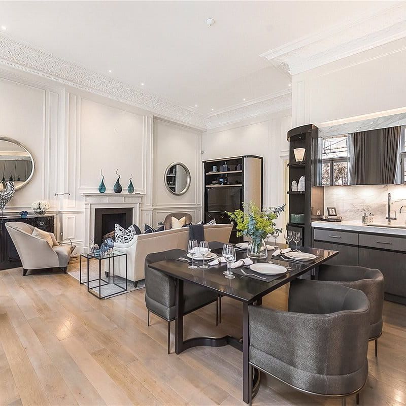 A beautifully presented two bedroom apartment situated on the favoured first floor (wihtout lift) of this impressive period building in the heart of Knightsbridge Village. EPC rating: D - Photo 1