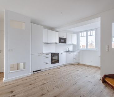 Modernes Wohnen im Herzen der Stadt: Helle und renovierte Maisonett... - Photo 3