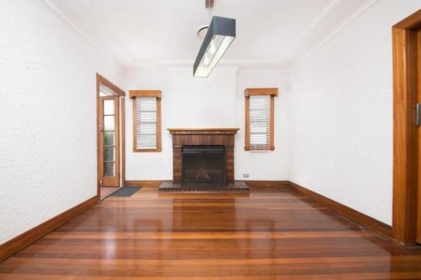 Elegant Stucco Double Brick Home with Character and Modern Comfort - Photo 1