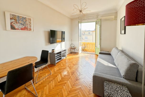 NICE CENTRE BD DUBOUCHAGE GRAND 2P MEUBLE DERNIER ETAGE BALCONS - Photo 1