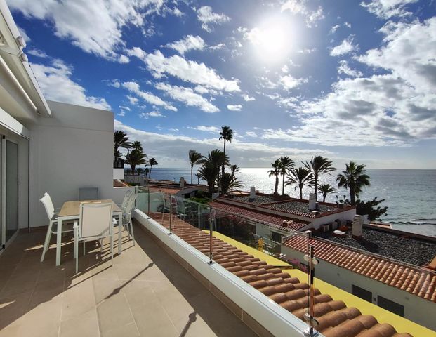 Spectacular Renovated Beachfront Bungalow in Águila Playa - Photo 1