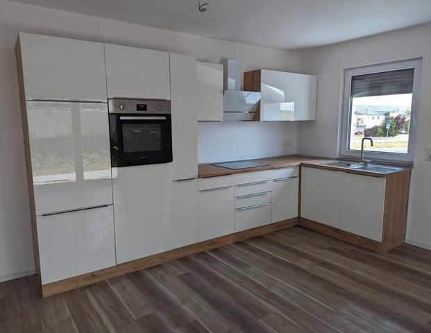 DG-Wohnung mit Balkon, Energieeffizienzklasse A+ - Photo 1