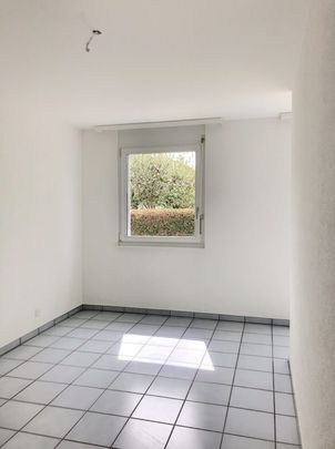 Au rez-de-chaussée et avec terrasse, joli appartement de 1.5 pièces - Photo 1