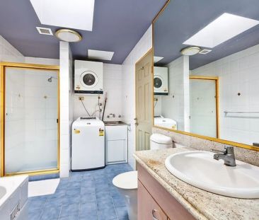 Three Bedroom Townhouse in Desirable Location - Photo 4