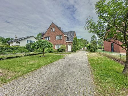 Half open woning met grote tuin en 2, mogelijk 3 slaapkamers. - Photo 5